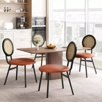 Modern upholstered dining chairs  Contemporary set with natural rattan backrest, metal legs  Space-saving design for dining room