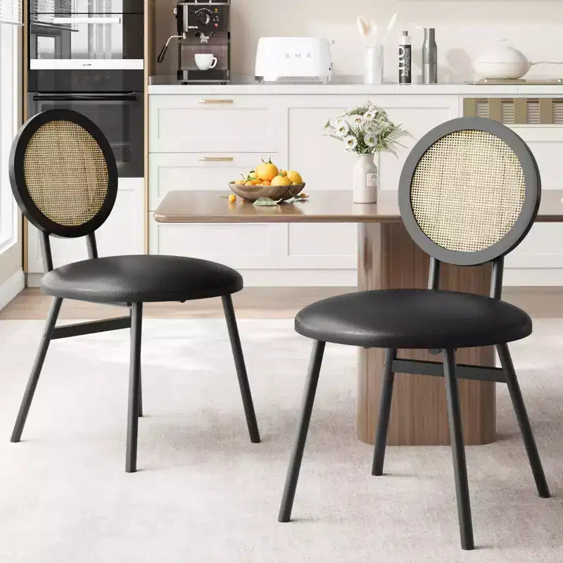 Modern upholstered dining chairs  Contemporary set with natural rattan backrest, metal legs  Space-saving design for dining room