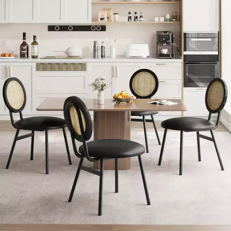 Modern upholstered dining chairs  Contemporary set with natural rattan backrest, metal legs  Space-saving design for dining room
