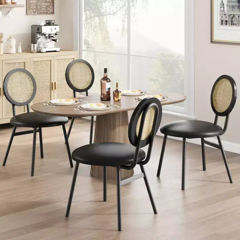 Modern upholstered dining chairs  Contemporary set with natural rattan backrest, metal legs  Space-saving design for dining room