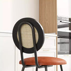 Modern upholstered dining chairs  Contemporary set with natural rattan backrest, metal legs  Space-saving design for dining room