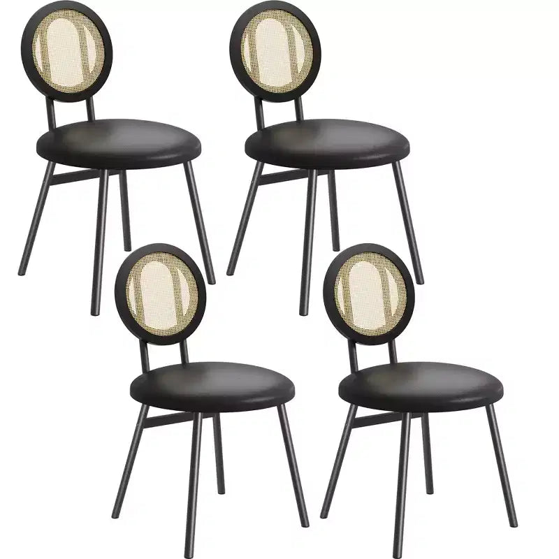 Modern upholstered dining chairs  Contemporary set with natural rattan backrest, metal legs  Space-saving design for dining room