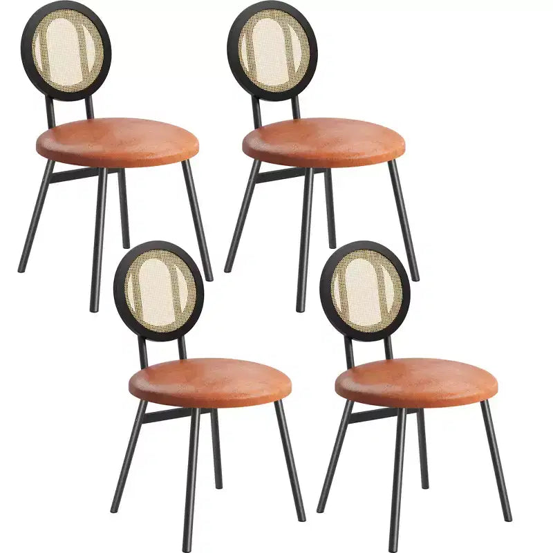 Modern upholstered dining chairs  Contemporary set with natural rattan backrest, metal legs  Space-saving design for dining room