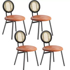 Modern upholstered dining chairs  Contemporary set with natural rattan backrest, metal legs  Space-saving design for dining room