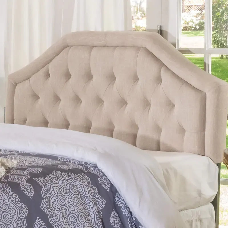 Testiera imbottita regolabile per letto a una piazza e mezza/matrimoniale con bottoni decorativi e gambe in ferro nero, design curvo