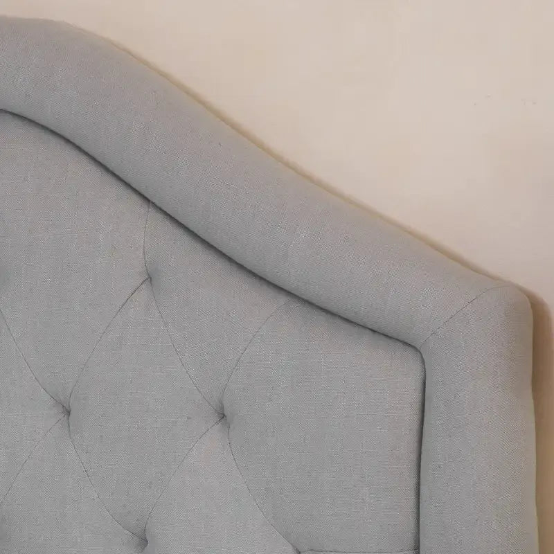 Testiera imbottita regolabile per letto a una piazza e mezza/matrimoniale con bottoni decorativi e gambe in ferro nero, design curvo