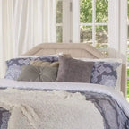 Testiera imbottita regolabile per letto a una piazza e mezza/matrimoniale con bottoni decorativi e gambe in ferro nero, design curvo
